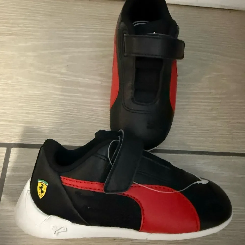 Brand new Puma Kids Black and Red Sneakers
